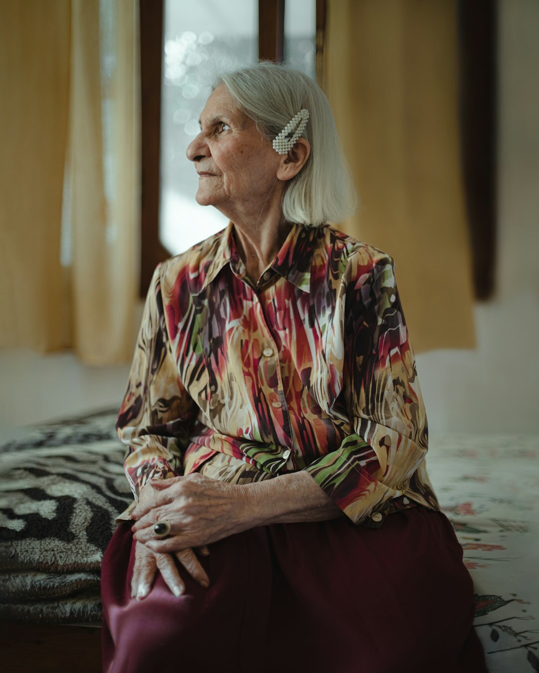 Elderly Croatian woman in traditional Zagorje dress being interviewed at home